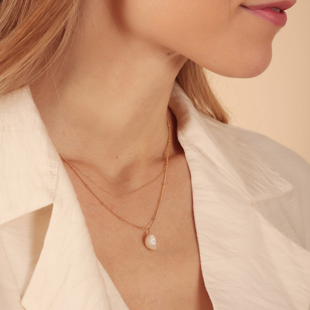 Layered Gold Chain Necklace with Baroque Pearl Pendant